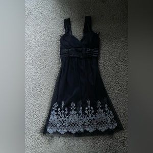 Black dress silk embroidered with padding